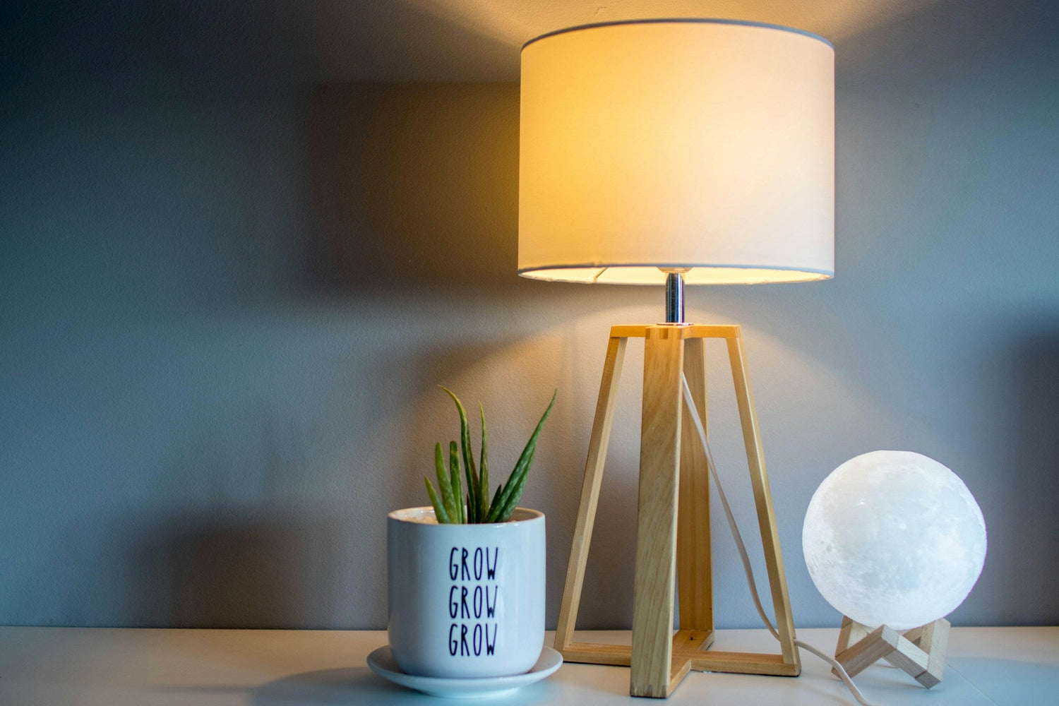 Decorative-table-lamp-with-soft-ambient-lighting-on-side-table